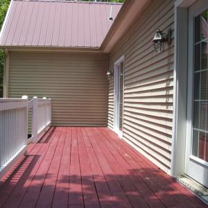 Rear deck - Note entrances to deck from dining area as well as from the living room