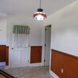 Kitchen door to the attached garage