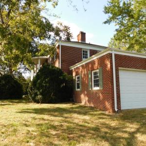 Front view showing attached garage