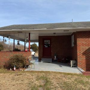 Rear entrance from Carport, Easily get from car into house during bad weather.