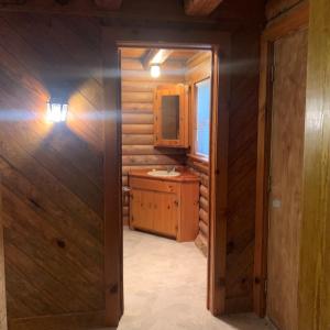 Hallway leading into Bathroom
