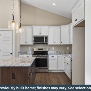 Kitchen, SS Dishwasher, Microwave, and Drop In Range included