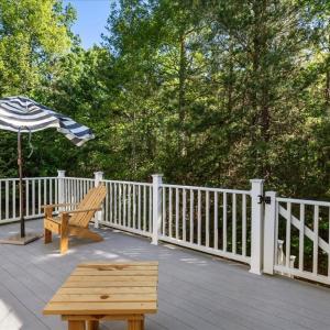 Deck , The Deck can be accessed from the Sun Room for extra enjoyment of the natural setting.