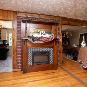 Fireplace Conveys, This electric fireplace with antique mantle