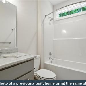 Hall Bathroom, Tub/Shower Combination, Transom Window, Granite Counters, LVP Flooring