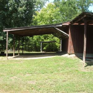 Attached shed on shop building