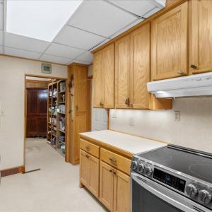 Primary Kitchen - Main Floor, The kitchen is the hub of the home, with spokes to the dining room, upstairs, downstairs, laundry center, living room, and office.