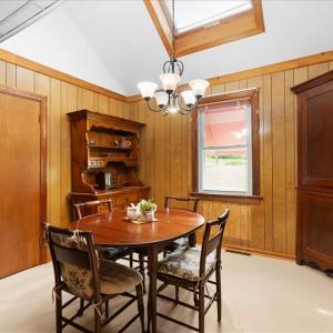 Dining Room, A skylight brings natural lighting into the dining room and the loft above.