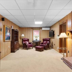 Sitting Room, This room offers space as a family den, sitting room, home office, or more.