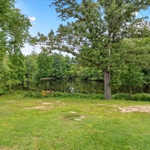 View of Lake from Primary Porch, The natural setting becomes an extension of the home.