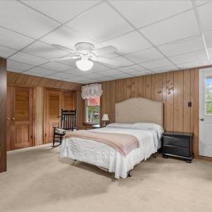 Bedroom 4 on Second Floor, Double closets and an additional linen closet enhance the bedroom.