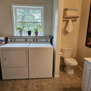 Hall bath with laundry in addition