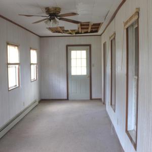 Enclosed front porch.