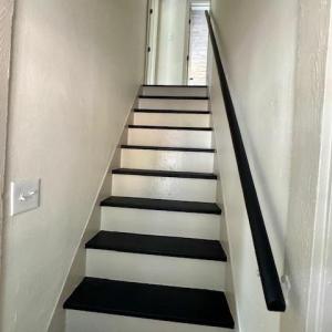 stairs to 3 bedrooms