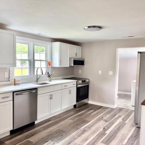 Brand new kitchen with stainless steel appliances