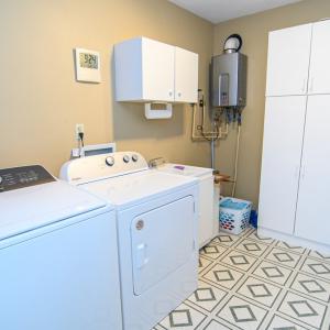Large laundry room with tons of storage