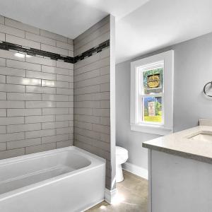 1st floor full bath off laundry and bonus room