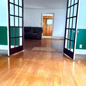 Dining room through french doors to LR