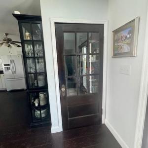 Pantry with attractive heirloom door.