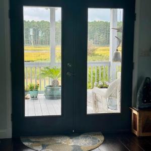 Upper level french doors to sleeping porch.