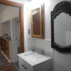 For convenience you can enter the downstairs bath from the LR as well as the kitchen.
