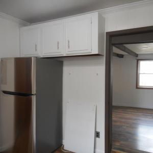 The dining room is easily accessed from kitchen.