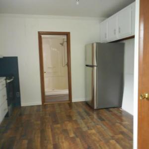 This is a view from the back door. If you've been working hard in the yard, just walk through to the full bath.