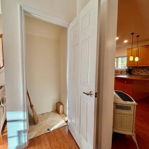 Downstairs Closet w/access, You can access the crawlspace in this closet.  Brilliant!