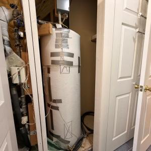 Hot Water Heater, Owner drains every 6 months as part of maintenance.  Wrapped for efficiency.  50 gallon tank