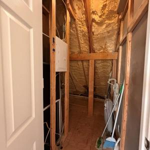 Upstairs storage, Has light.  Access through bedroom
