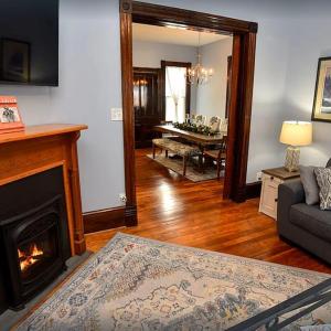 Living Room, Gas Fireplace with original mantle.