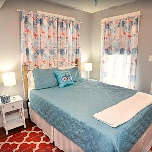 Second Floor Bedroom, This bedroom leads to a private balcony.