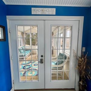 French doors to lovely screened porch