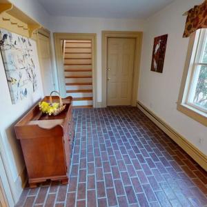 Bonus room connects main house to primary suite