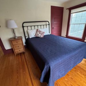 Bedroom 2 with door to walkup attic