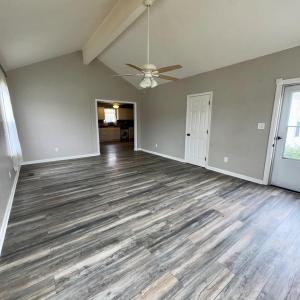 Spacious living room with new LVP flooring