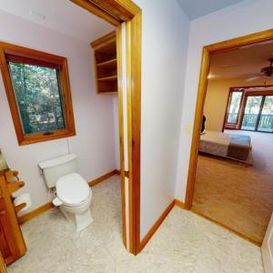 Primary bedroom ensuite toilet chamber