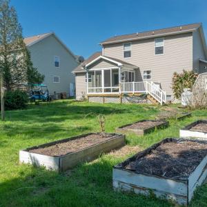 Rear yard with raised beds