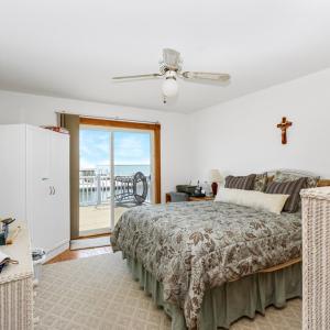 Main Level Bedroom With Walkout To Deck