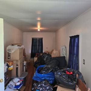 Room off of garage, Currently storage, but could be anything. Office, workout room.