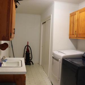 utility room off kitchen and garage.