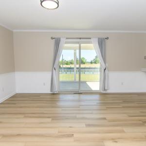 Dinning Area off kitchen with Slider acess to cove