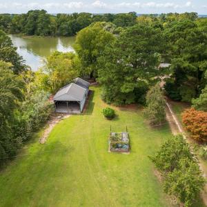View from above with Barn and open area of yard