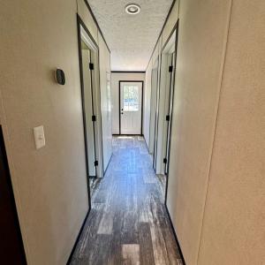 Hallway to 2nd & 3rd bedrooms