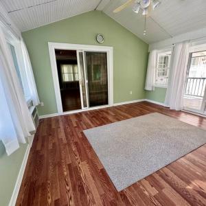 Sunroom leading into family room