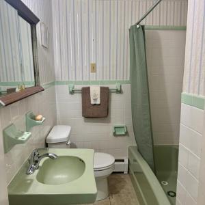 Bathroom between family room and formal living roo