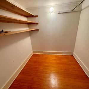 1 of 2 walk-in closets in bedroom 4