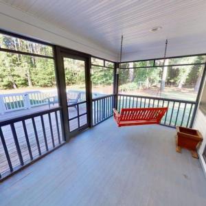 Screen porch with swing