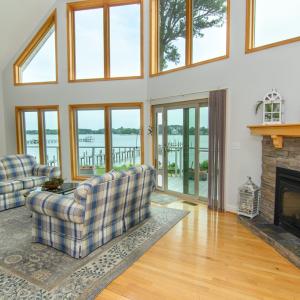 Living Room, The stone fireplace in the corner is gas with a manual switch.