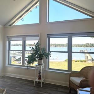 Sunroom, With windows on three sides, plus access to the wrap around deck, heated and cooled with mini split.